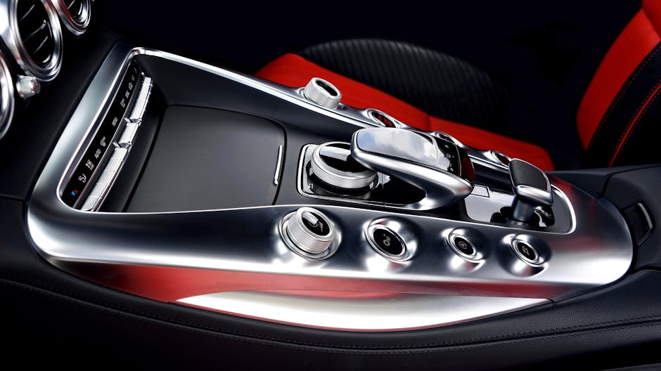 Seorang mekanik profesional sedang memeriksa komponen mesin motor modern menggunakan peralatan digital di sebuah bengkel resmi yang bersih.